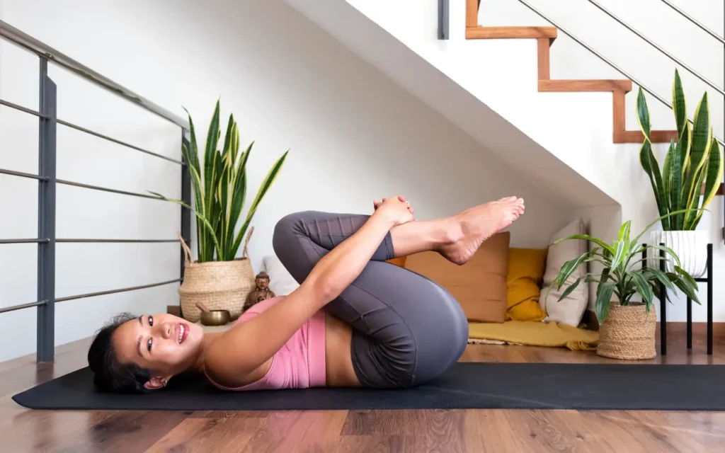 Sciatica Exercises You Can Safely Do at Home - Single Knee-to-Chest Stretch